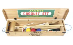 A modern Jacques croquet set, in hinged pine box stamped Jacques/Croquet/London,