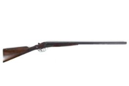 An early 20th century double barrelled shot gun