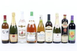 A collection of nine bottles of alcohol, including: Chateau de Bresse Bourgogne, 1990, 75 cl.