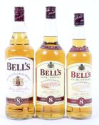 Bells Blended Scotch Whisky, aged for 8 years, three bottles, two being 1 Litre, the other 70cl,