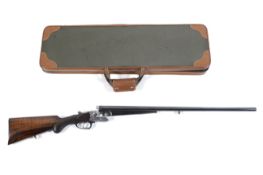 A Luneburg 16 gauge side by side hammer action shot gun, serial number 2122,
