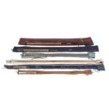 A collection of six assorted fishing rods,