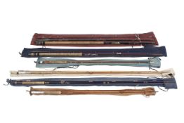 A collection of six assorted fishing rods,