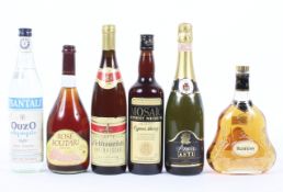 A collection of alcohol including: Hennessy Cognac, 40% Vol, 70 cl., Amore Asto, 75 cl