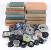 A large collection of mixed vintage fixed fishing reel spools to fit fly and f/s reels together