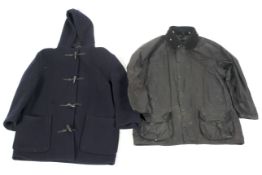 Two hunting coats including: a Barbour Beaufort jacket in black with chequered lining,