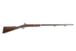 A 19th century percussion cap rifle with engraved game bird and scrolls to side, dark wood butt,