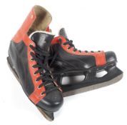 A pair of vintage JOFA ice skates, in black and red leather, the blades 11"/280mm, marked size 43,