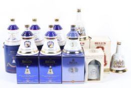 A collection of nine boxed Bell's Whisky Royal Commemorative decanters and contents,