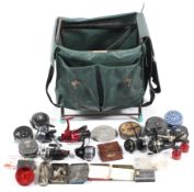 A seat box with a bag of fixed spool and fly fishing reels and tackle,