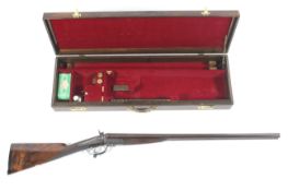 A George Gibbs Classic side by side hammer action 12 gauge shot gun, cylinder and cylinder,