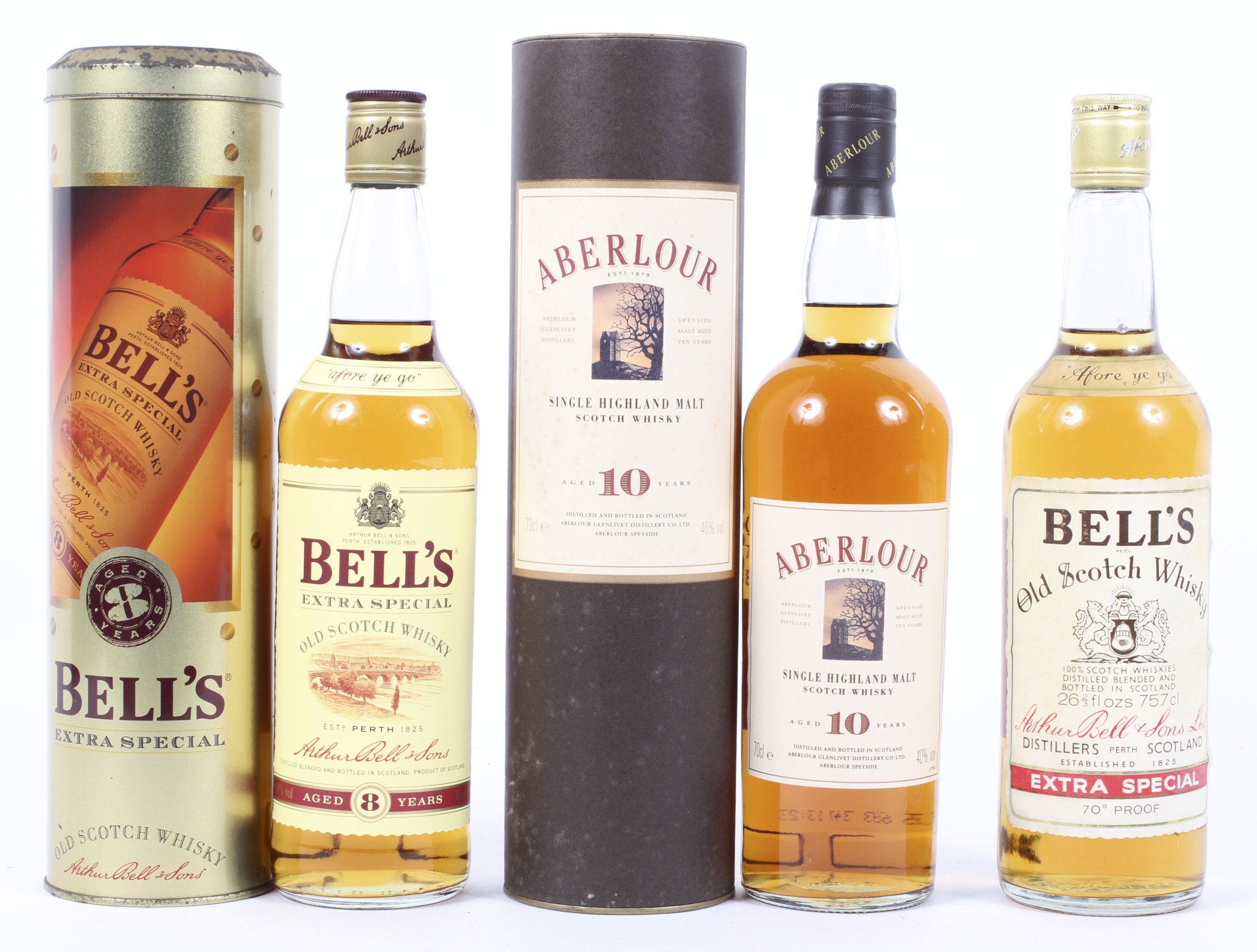 Whisky: Aberlour 10 years old, in cardboard tube; Bells Extra Special, aged 8 years, and another