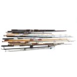 A collection of assorted fishing rods, including: Olympic 6ft, Daiwa Skipper HB700,