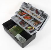 A sea tackle box with weights, hooks lures and other accessories,