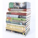 A selection of sporting books, including: books on angling, rugby and cricket,