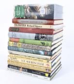 A selection of sporting books, including: books on angling, rugby and cricket,