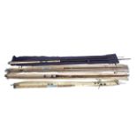 Four fishing rods, including: a 10’ Bruce and Walker spinning rod, a Martin James 2 piece sea rod,