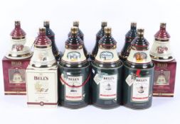 A collection of ten boxed Bell's whisky commemorative Christmas decanters and their contents,