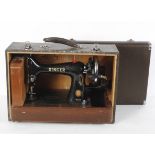 A Singer 99k hand cranked sewing machine