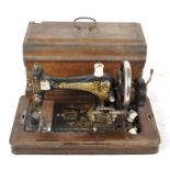 An antique Frister & Rossmann hand crank