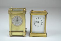 An Edwardian brass cased carriage clock, the silvered dial with Arabic numerals denoting hours,