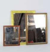 Three contemporary mirrors of rectangular form,