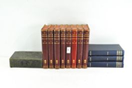 An assortment of hard back books, including 'The book of Knowledge',