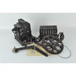 An early 20th century motor driven projector, possibly an Astor 22 model,