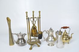 A collection of vintage brass to include a trivet, teapot, Persian style ewer, fire irons,