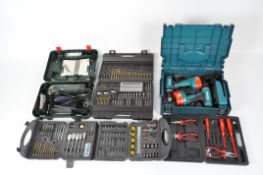 A selection of tools, including a Makita drill set, a Bosch PMF 190 E sanding tool,