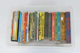 A selection of vintage children's annuals and books, including Robinson Crusoe,