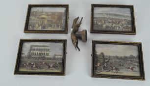 A cast metal model of a racing greyhound, together with four framed prints,