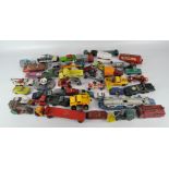 A collection of play worn Diecast vehicles, including examples by Corgi,