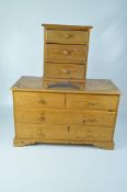 A pine low chest of drawers with two over two drawers, 68cm x 102cm x 51cm, and a bedside cabinet,