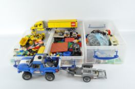 A large quantity of vintage Lego, including bricks of assorted shapes and sizes, vehicles,