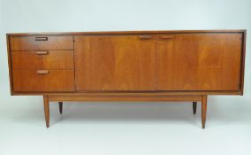 A retro oak sideboard, a bank of three drawers to the left, single door cupboards to the other side,