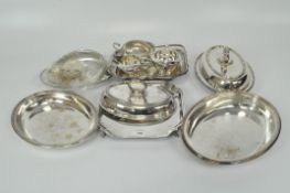 A selection of silver plated wares, including lidded entree dishes,
