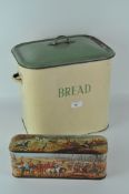 A vintage enamel 'Bread' bin, with handles to either side and a detachable green lid,