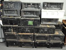 An archive of primarily 9mm format cassettes and tapes in twenty four metal ammunition cases