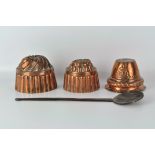 Three copper jelly moulds, of varying sizes, the largest 15cm diameter,