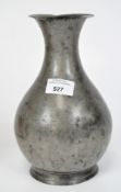 A silver plated vase, of baluster vase with a fluted rim,