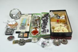 A selection of vintage costume jewellery, including a Timex, bracelet,
