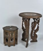 A Balinese carved side table with mythological animals together with a small occasional table