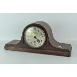 An early 20th century mantel clock, silvered dial with Arabic numerals, signed 'Pleasance & Harper,