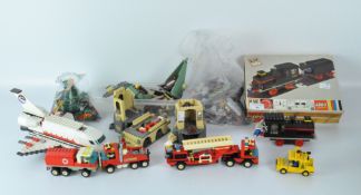 A large quantity of vintage Lego, including bricks of assorted shapes and colours, wheels,