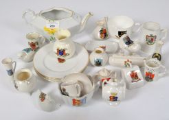 A collection of souvenir miniature crested wares and models including a submarine, chicken,
