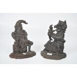 A pair of cast metal Punch and Judy door stops,