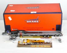 A incomplete Drake 1:50 scale '2x2 dolly, 4x8 Swingwing with Kenworth T909 prime mover', ZT09027,
