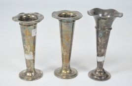 Three Mappin & Webb silver plated trumpet vases, heights