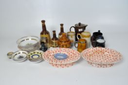 A collection of 20th century ceramics, to include three Bells whiskey decanters, stoneware mugs,